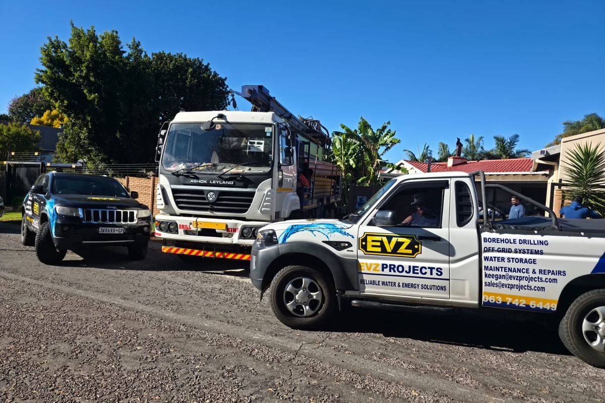 EVZ Projects service vehicles and drill rig positioned at borehole site