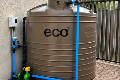 Mini water backup system — 1000L tank with 0.37kW booster pump installed at a Pretoria East home